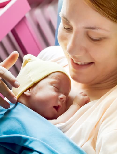 Mother in Hospital holding newborn Mother in Hospital holding newborn