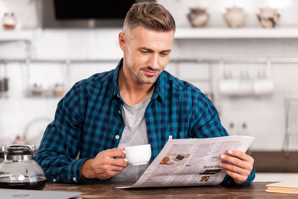 Man-reading-newspaper